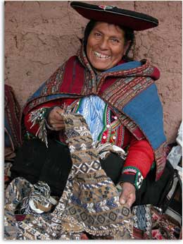 Peruvian woman selling her textiles at a cooperative